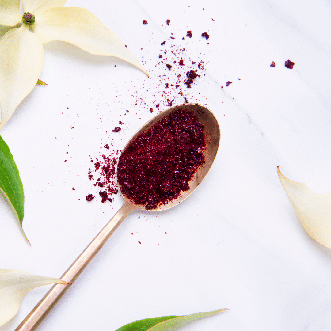 Spoon with Flora organic red beet crystals energizing superfood content